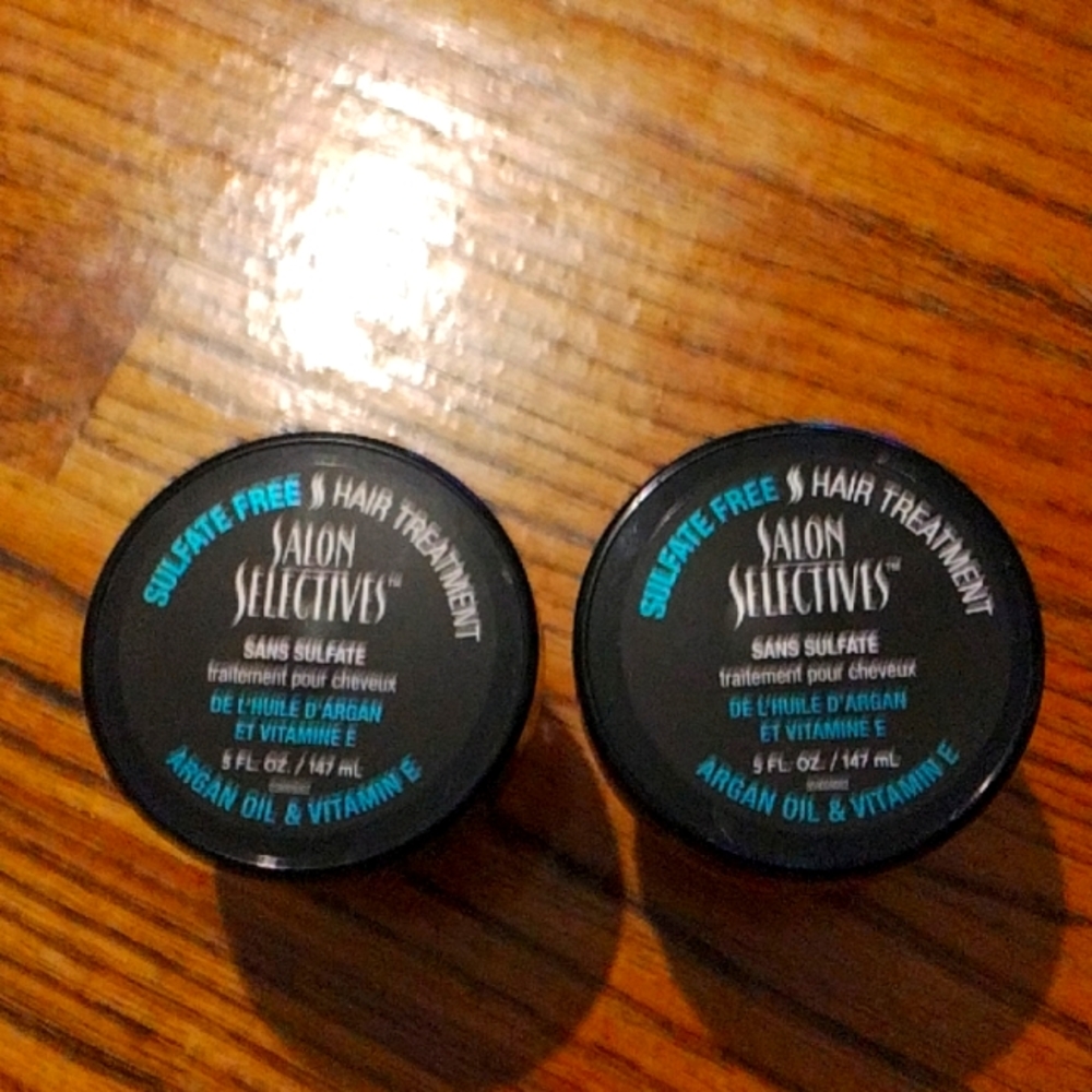 Two jars of damage repair treatment